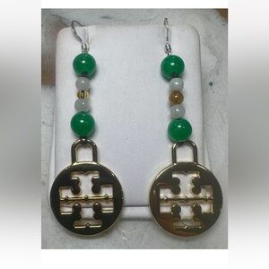 Green carved jade drop dangle earrings with sterling hook back.
